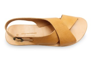 Sandales croisées en cuir vachetta naturel et semelles en cuir vue supérieure.